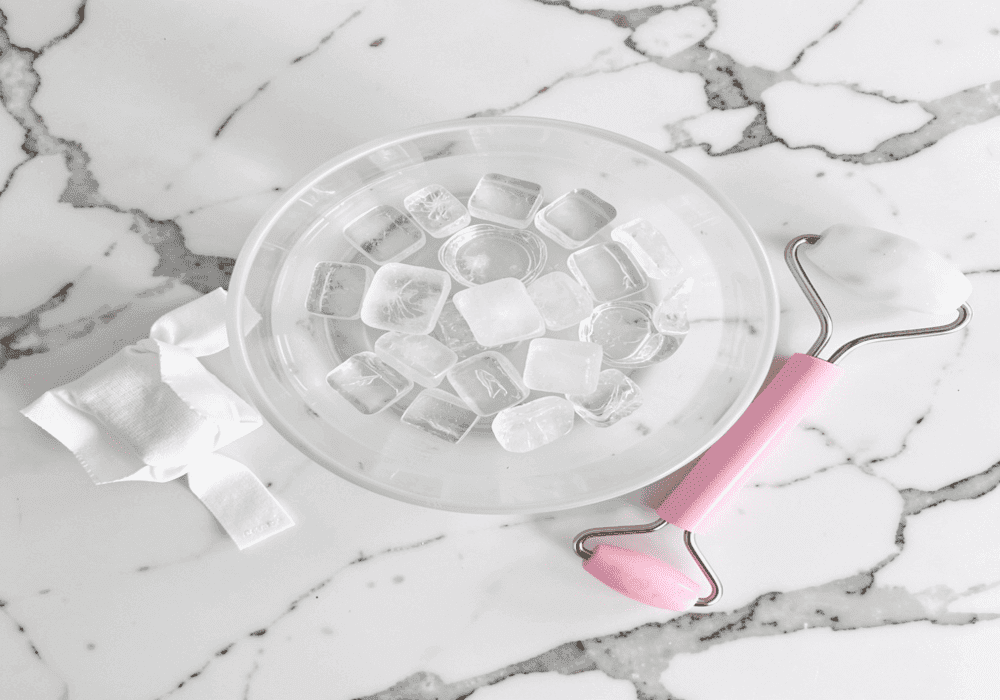 Ice cube, ice water bowl, and ice roller used for at-home ice facial
